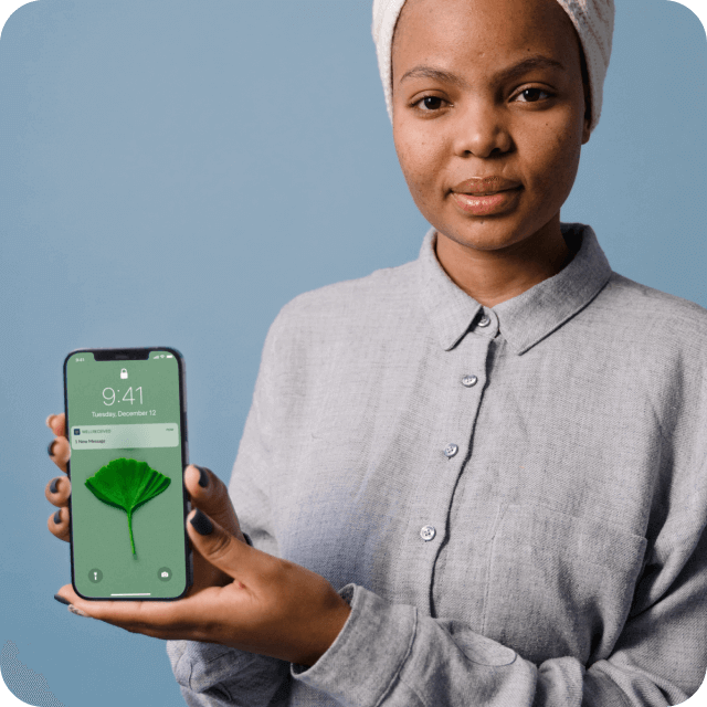 Female doctor showing phone