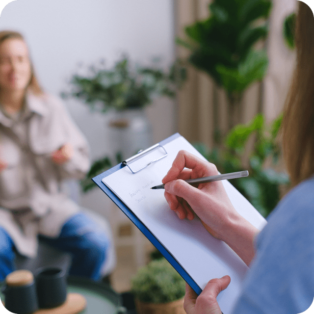 Female receptionist taking notes