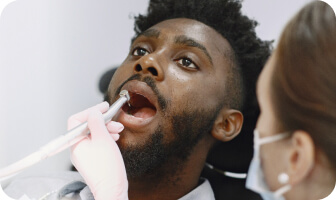 Dentist Checking Teeth